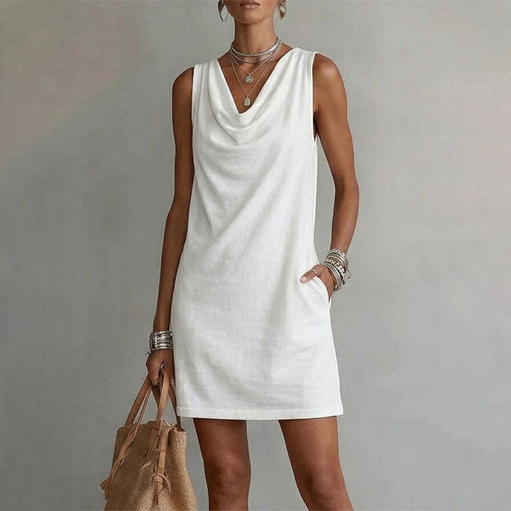 👗 50% DI SCONTO ORA! ⏰ Elegante Abito Slim Fit con Scollo a Cowl – Senza maniche, tasche laterali e versatile – Drappeggio valorizzante, perfetto per il lavoro o le serate – Comodo e chic ✨🌸